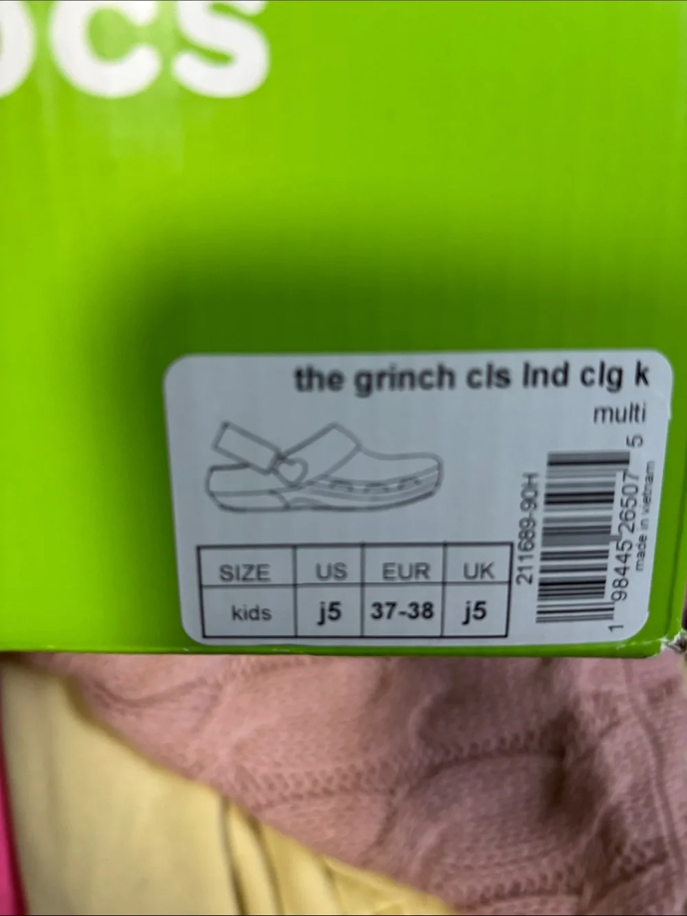 CROCS Kids Grinch Plush Slip-Ons in Green and Red